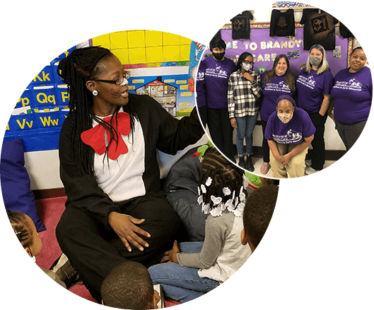 A woman sitting on the floor with children.